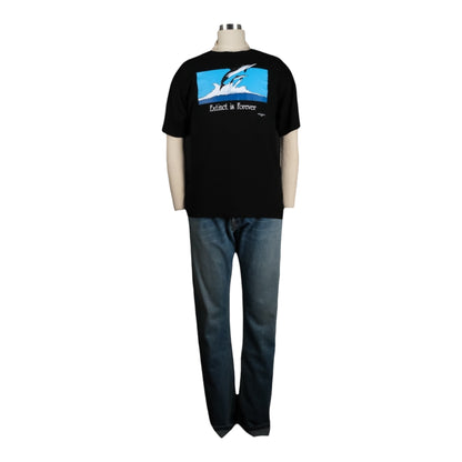 Black t-shirt with a dolphin graphic and text on a mannequin against a white background